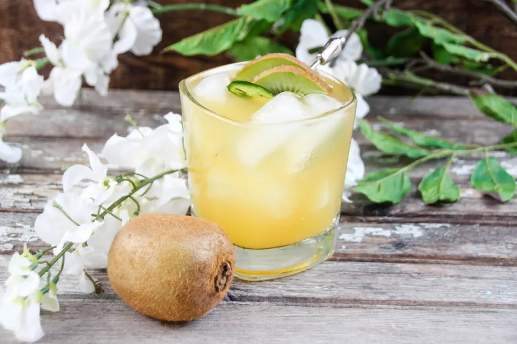 Spicy Tropical Bourbon Cocktail 1 Take your taste buds on a trip to the islands with this Spicy Tropical Bourbon Cocktail, boasting with the flavors of grapefruit, pineapple, and fresh kiwi.