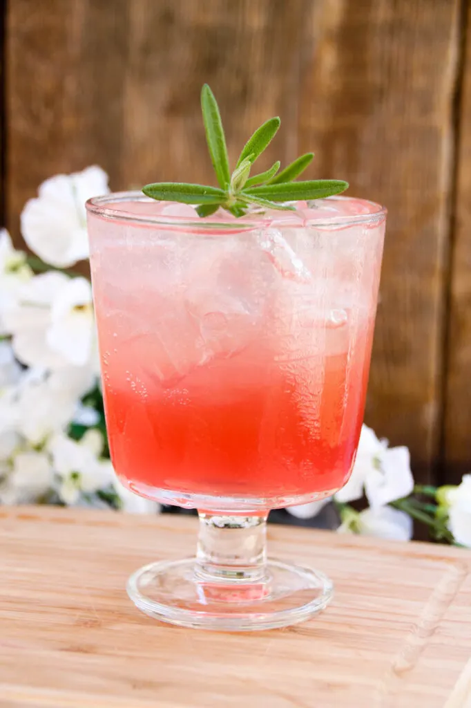 The soft and sweet flavors of bourbon bounce off the tart cranberry lemonade in this summer Buffalo Cocktail recipe you are sure to love! Pair this delicious cocktail with your favorite summer recipe like a summer jambalaya or a light and refreshing wedge salad with smokey bacon and dill dressing, even a rich and decadent chocolate Torte.