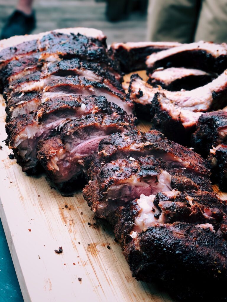 Bring bring the BBQ inside and create a melt in your mouth BBQ dinner everyone will love with this melt in your mouth oven baked BBQ baby back ribs recipe.