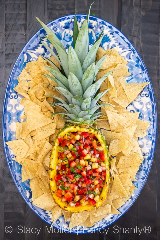 This Strawberry Pineapple Salsa recipe is a delightful twist on a traditional salsa recipe that incorporates the flavors of sweet strawberries and tropical pineapple. The contrast of the sweet fruits with the savory ingredients like red onion and jalapeno pepper makes it an appealing dish for a wide range of palates.