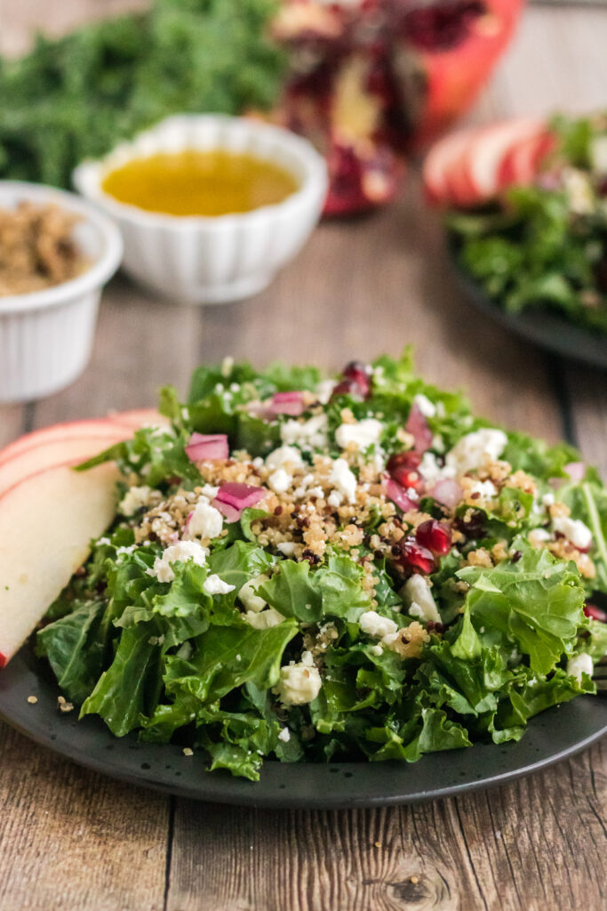 Words cannot describe how delicious this kale and quinoa salad is. Fresh kale leaves are topped with sweet crisp apples, nutritious quinoa, feta cheese, and pomegranate perils, then topped with a simple lemon dressing creating a delicious salad anytime of year!