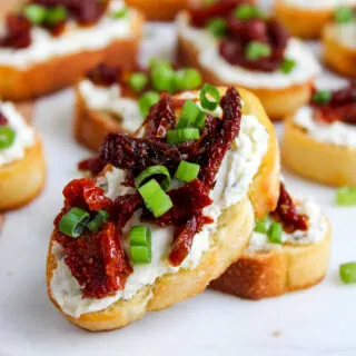 This Sun-Dried Tomato Crostini recipe is a delicious and easy-to-make appetizer that's perfect for parties, gatherings, or simply to enjoy with a glass of wine. Here's a simple recipe to make these flavorful crostinis.